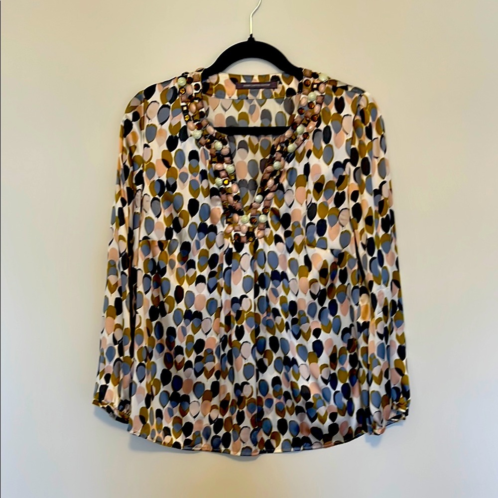 Boden silk limited edition, feather print blouse with embellishments.